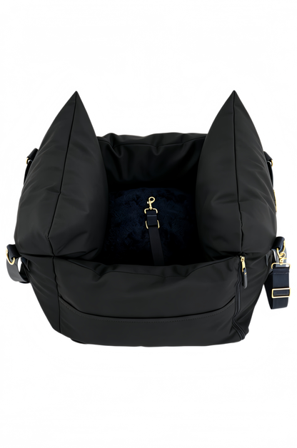 Top view of the black dog car seat with raised side bolsters and inner harness clip