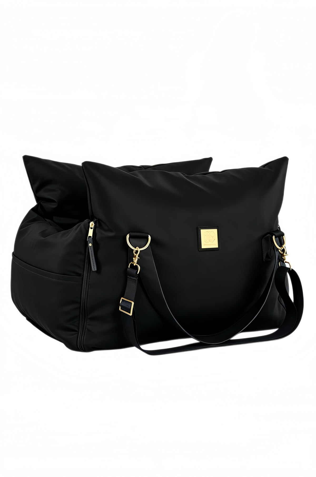 Black petsperro dog car seat folded into carry-bag shape with shoulder strap and gold hardware