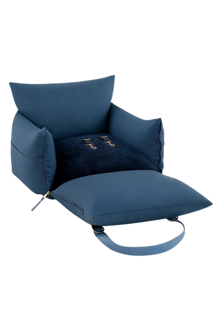 Navy dog car seat bed opened flat, showing the plush base, bolsters and harness clips