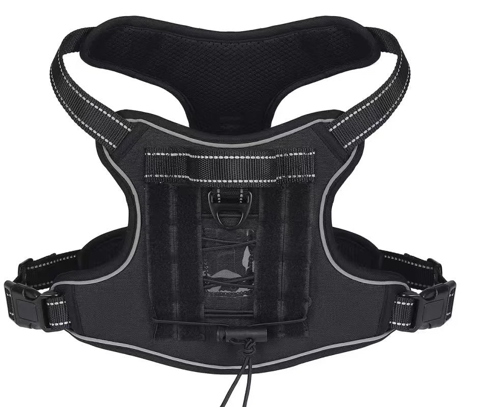 black tactical dog harness with reflective trim and hook-and-loop back panel