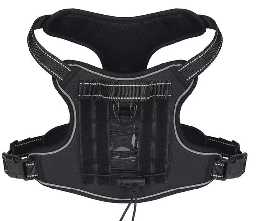 black tactical dog harness with reflective trim and hook-and-loop back panel
