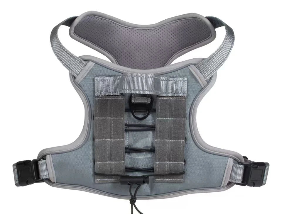 gray tactical dog harness with reflective trim and hook-and-loop back panel